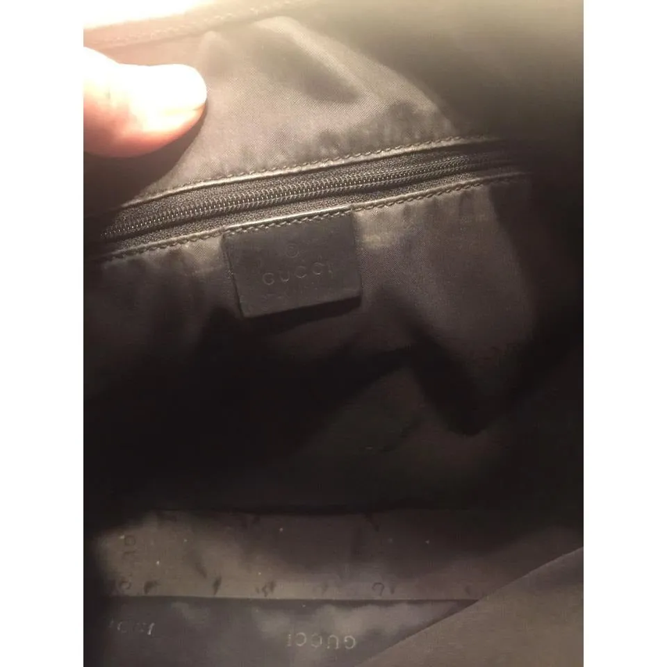 SOLD- Gucci, extra large size, classic, Jackie- O bag, made in hard to find,black all leather with a chrome piston closure and buckle