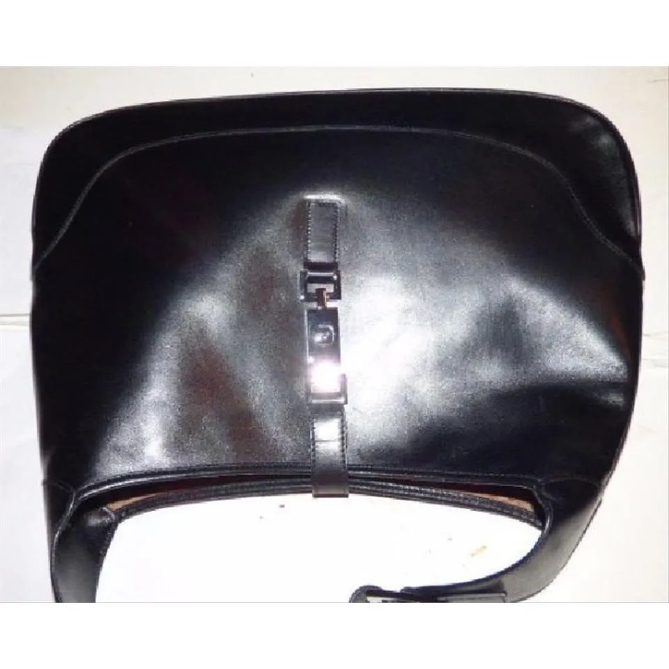 SOLD- Gucci, extra large size, classic, Jackie- O bag, made in hard to find,black all leather with a chrome piston closure and buckle
